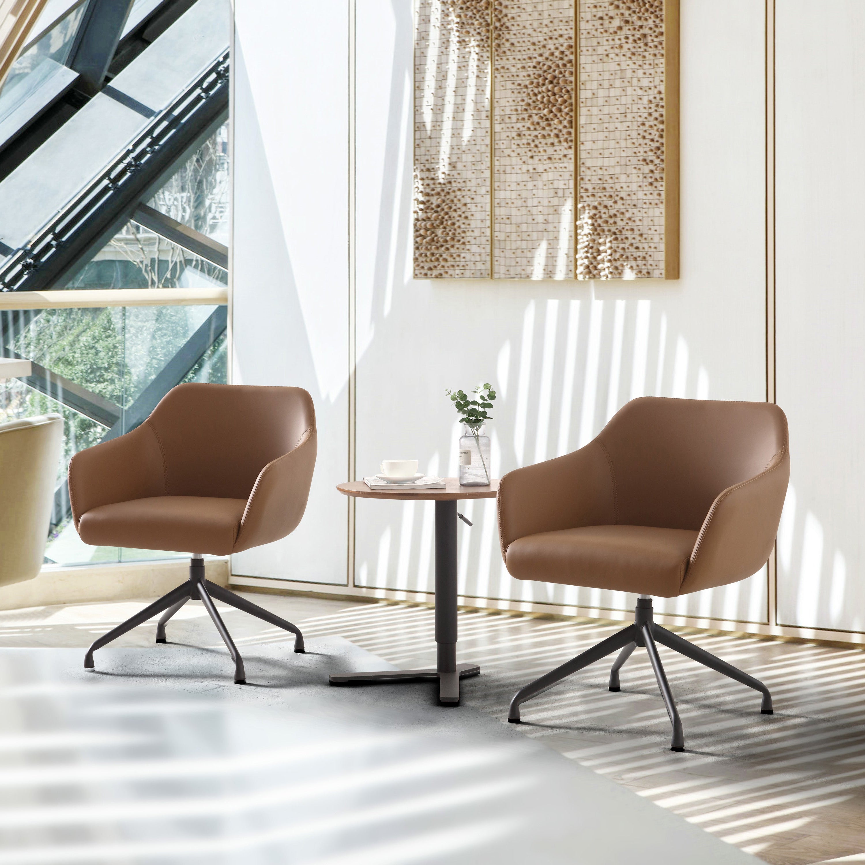 Silla de visita tapizada en cuero